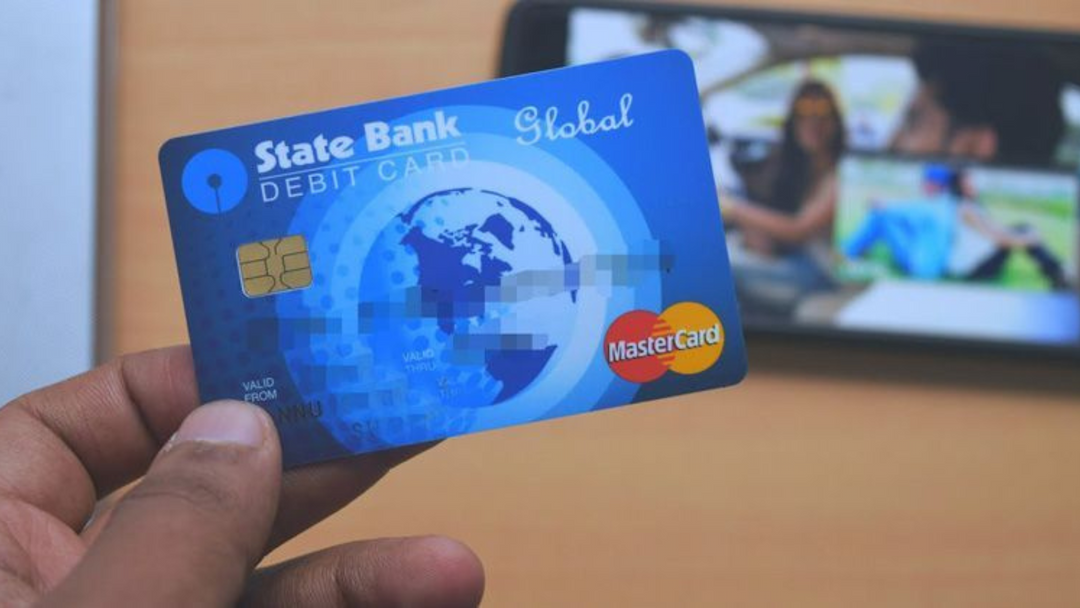 SBI डेबिट और क्रेडिट कार्ड रखने वालों को बड़ा झटका!, 1 अप्रैल से... SBI debit card credit card Increase in annual maintenance charge by up to Rs 75 in case