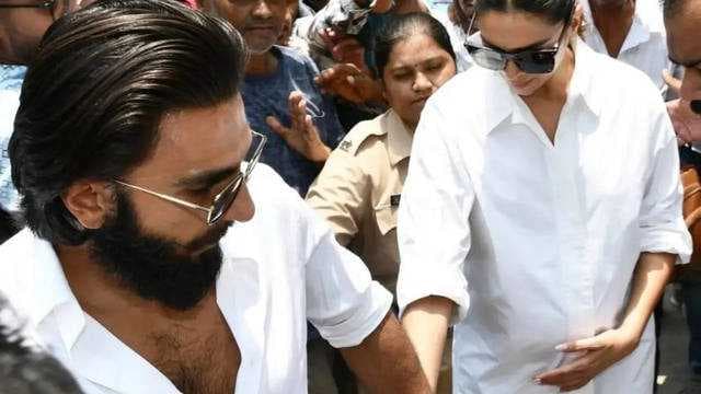 Deepika Padukone flaunts her baby bump for the first time, Ranveer Singh protects her from crowd at polling booth